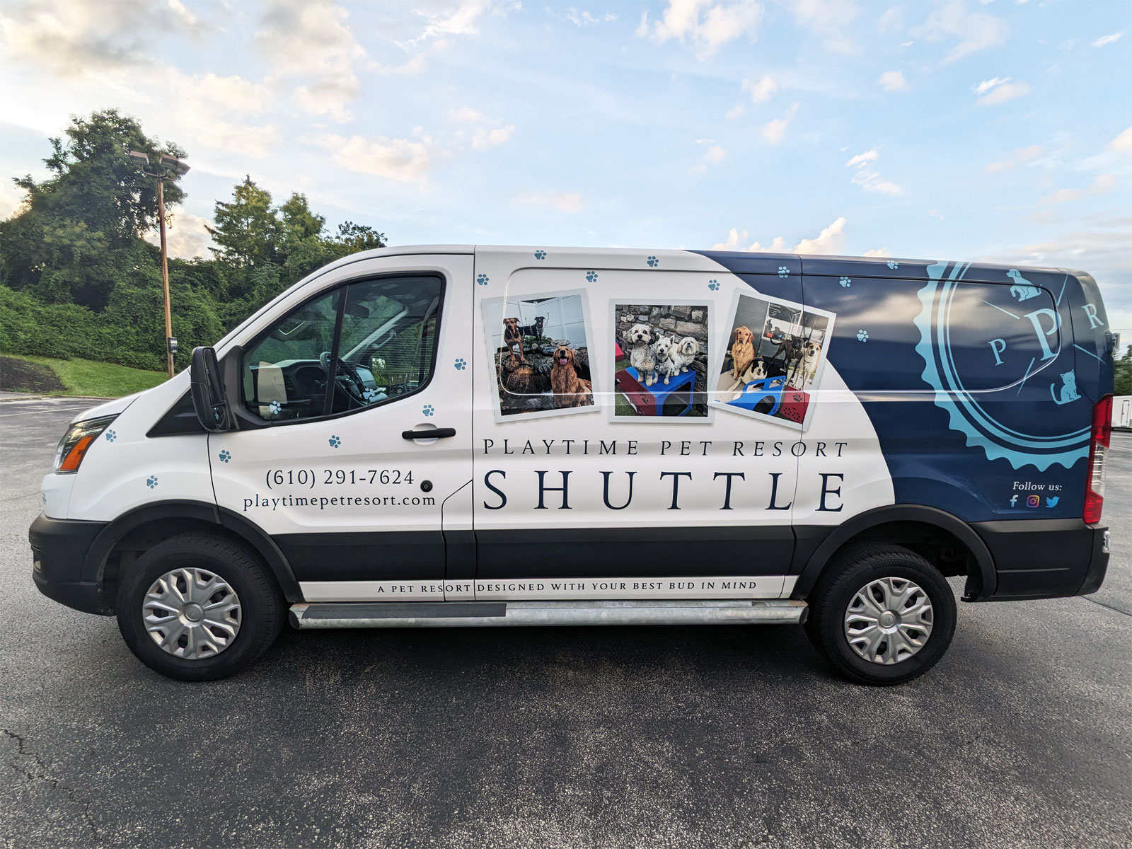 Image of the side of the Playtime Pet Resort shuttle van